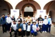 Estudiantes celebrando en la Liga Escolar de Basquetbol